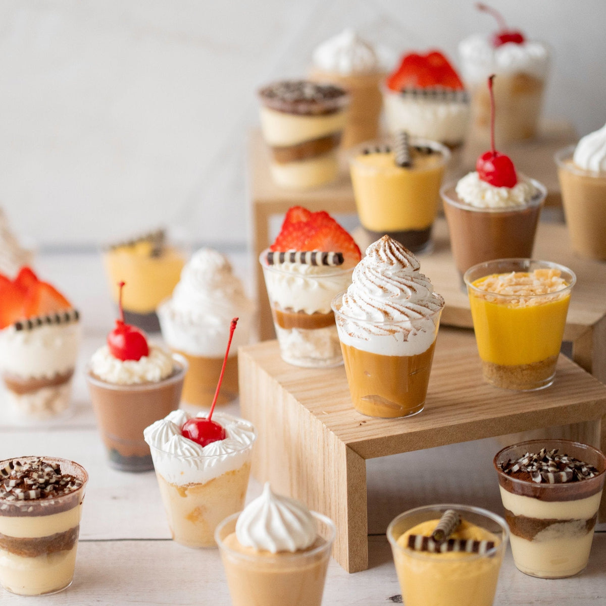 Assorted dessert shots by Delizzia